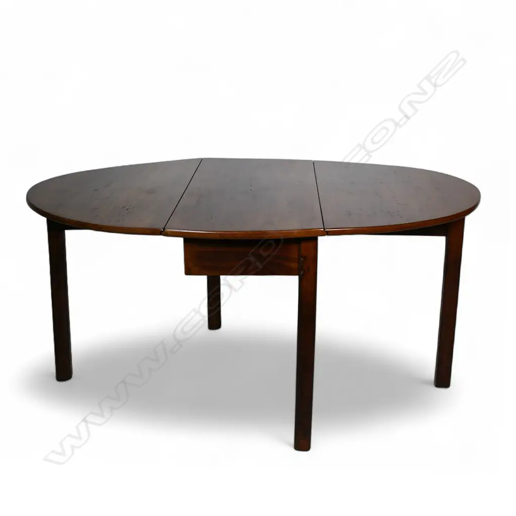An English c.1770 oval flame mahogany drop leaf table, Image 1++